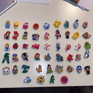 49-Count of Random Croc Pegs/Charms